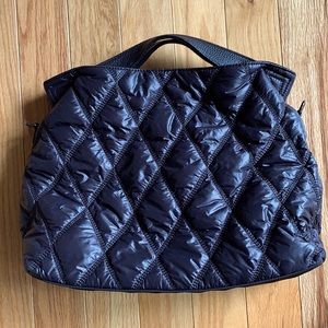 Black Lightweight quilted shoulder bag with detachable shoulder strap.